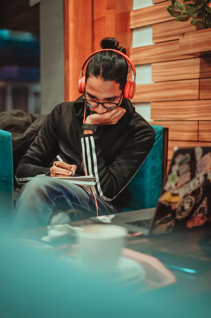 Person listening to music with headphones